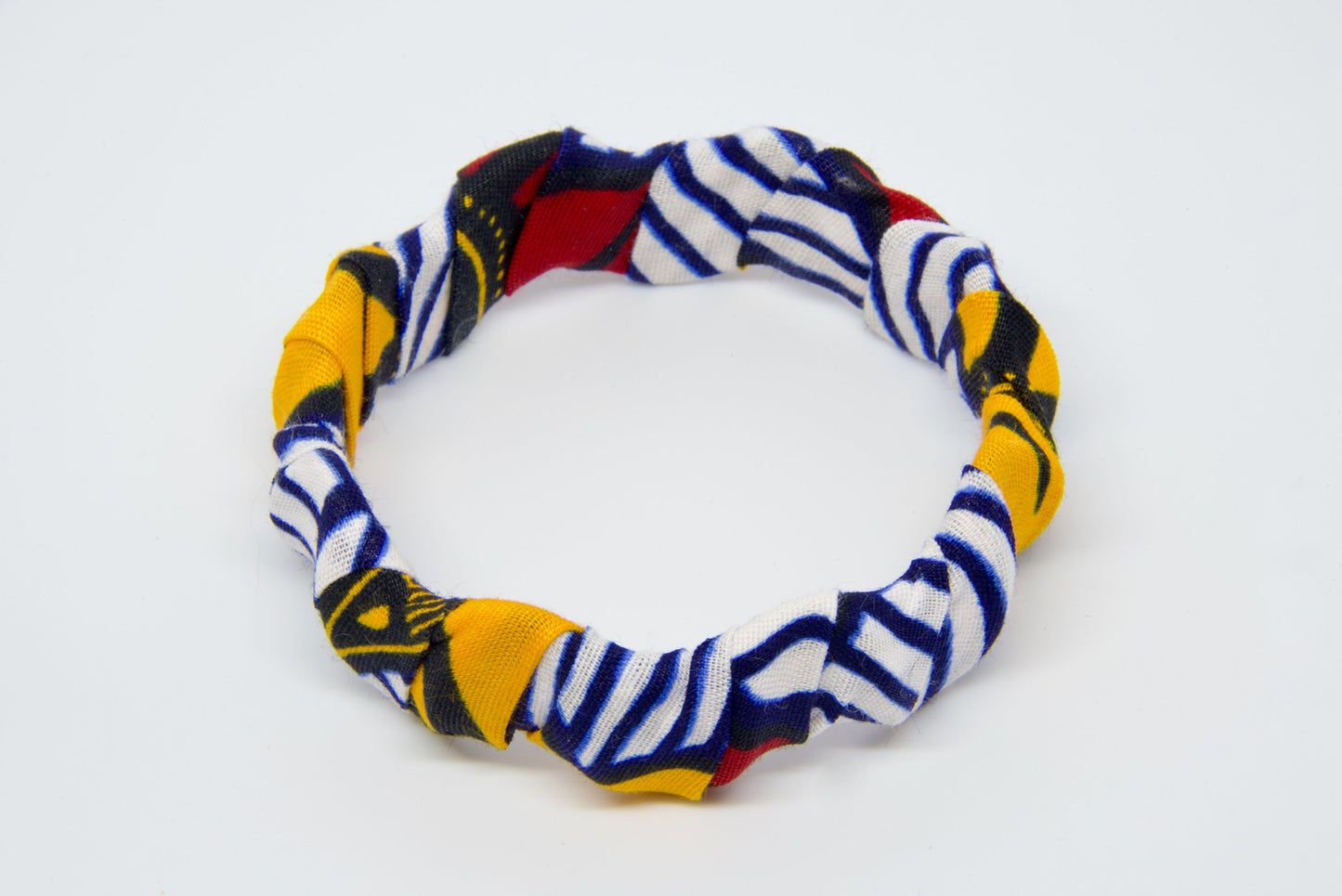 Bracelet torsadé wax blanc rayures bleu marine, jaune et rouge artisanal - Djêkoo Wax