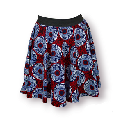 Jupe coupe patineuse en tissu wax fait main, de couleurs rouge bleu foncé et noir, motifs disques