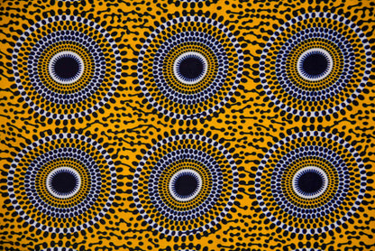 Détail du tissu wax motif Disque jaune et noir