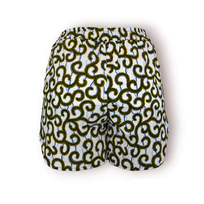 Vue dos short femme en tissu wax blanc cassé à motifs spirales vert kaki et jaune citron sur fond lignes bleues avec ceinture élastique et bandes latérales noires - Djêkoo Wax

