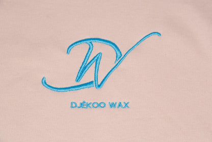 Broderie 10cm x 10cm bleu turquoise du Logo Djêkoo Wax sur le devant du sweat à capuche